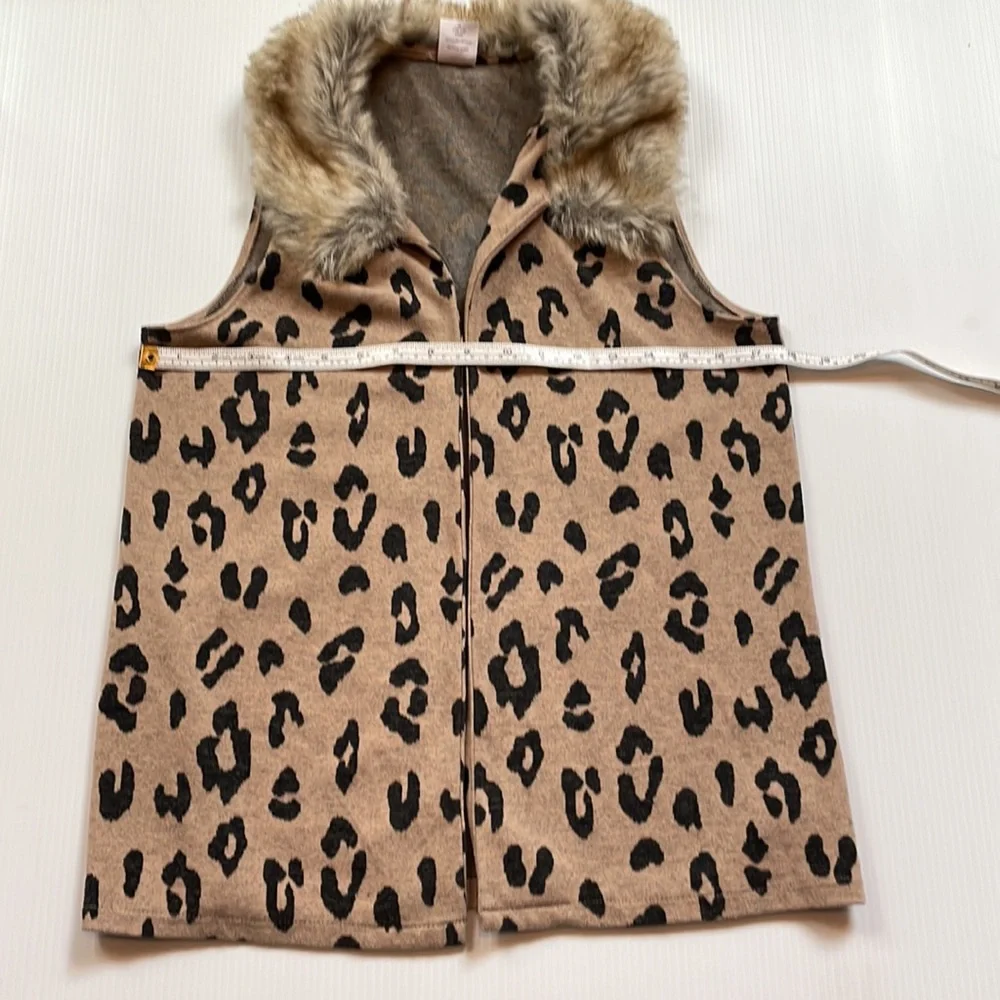 Cheetah print, tan & brown faux fur collared vest.  Girls size large + plus